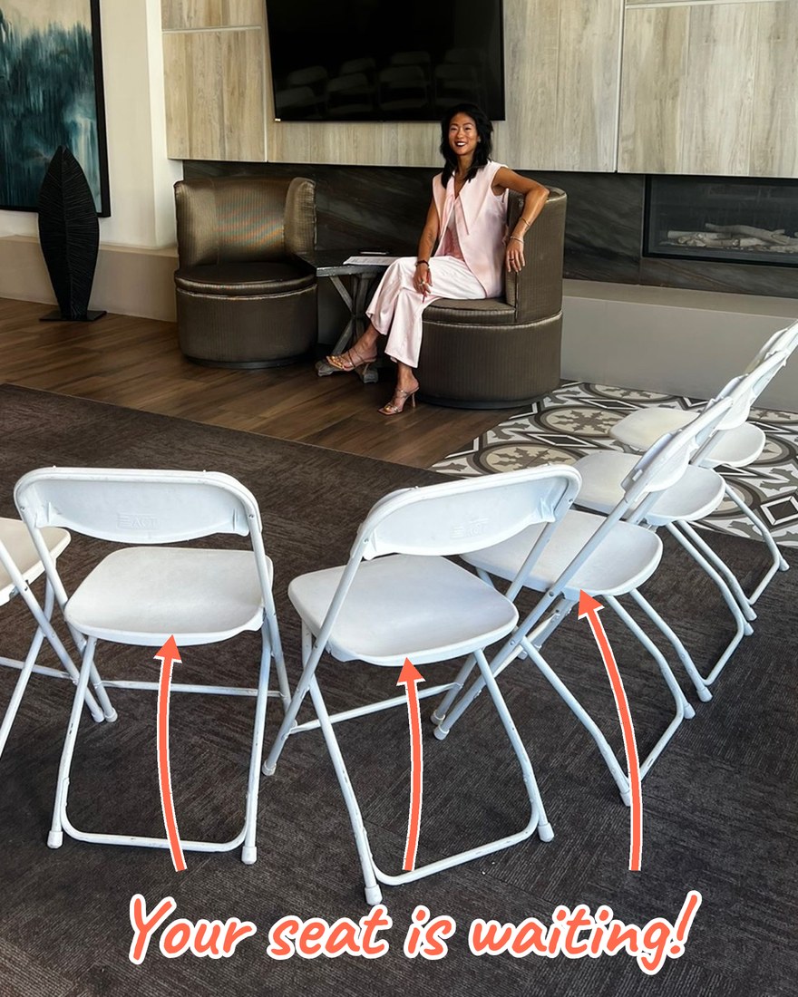 Samantha beside a circle of empty chairs, with arrows pointing at the seats: Your seat is waiting!